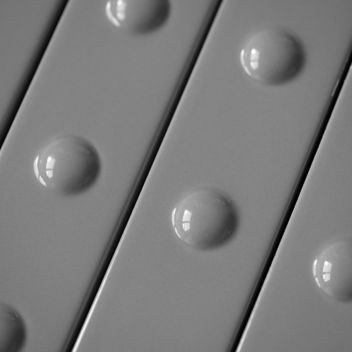 Punto Glossy Gris Up — yüzey detayı